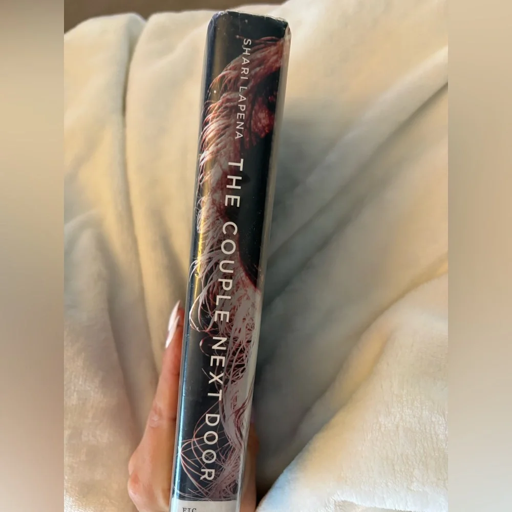 The Couple Next Door Hardcover Book by Shari Lapena - Picture 2 of 8